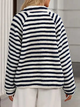 Women’s cow print fleece jacket in brown and white stripes