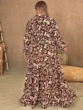 Brown and white paisley print maxi dress with long sleeves