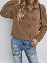 Brown corduroy jacket with gold buttons, pockets, distressed jeans, crossbody bag