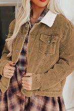 Brown corduroy jacket with shearling collar and button closure