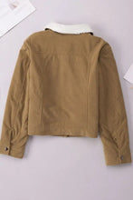 Brown corduroy jacket with beige shearling collar and button closure