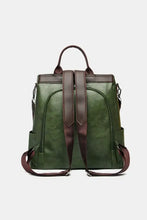 Dark green leather backpack bag with brown straps and top handle