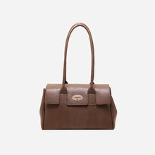 Brown PU leather shoulder bag with gold-tone turn-lock closure