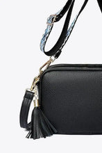 Black leather tassel crossbody bag with woven strap