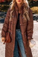 Brown quilted puffer coat with fur trim and belt