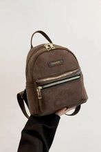 Brown suede adjustable strap mini backpack with gold hardware