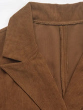 Brown suede double-breasted blazer with decorative pocket flap lapel