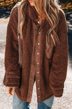 Brown teddy bear coat with zipper, button closure, and pockets