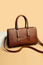 Brown textured PU leather handbag with crocodile pattern and silver buckle