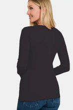Blonde woman in brushed microfiber long sleeve round neck t-shirt and jeans