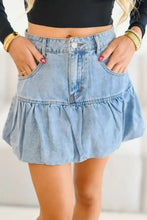 Light-wash denim mini skirt with bubble hem ruffle and front pockets, perfect casual denim mini skirt for summer