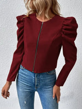 Burgundy cropped jacket with ruffled sleeves and zipper closure