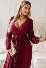 Burgundy long sleeve maxi dress with lace sleeves and tie waist
