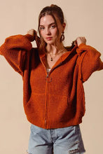 Burnt orange hooded textured cardigan with zip and bell sleeves
