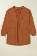 Burnt orange long sleeve pocketed open cardigan with brown texture
