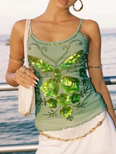 A shimmering mint green butterfly embellished slim fit camisole top with sequins and delicate beaded floral accents