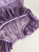 A delicate lavender butterfly lace tube top bodysuit with ruffled fabric and sheer mesh panels