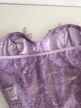 Lavender butterfly lace tube top with satin-lined interior and delicate butterfly embellishments in lace material