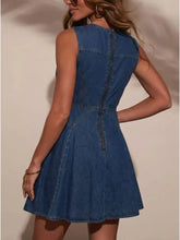 Blue denim sleeveless dress with back zipper and flared skirt showcasing the back side of sleeveless denim dress