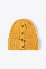 Mustard yellow rib-knit cuff beanie with brown button details