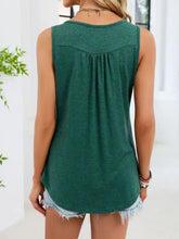 A soft heathered green round neck tank with a relaxed fit and gently gathered back neckline button detail