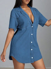 Blue denim dress with collared neck, short sleeves, button-front design, and slightly stretchy fabric