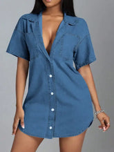 Blue denim dress with collared neck front pockets short sleeves and slightly stretchy fabric button down style