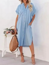 Light blue denim midi shirt dress with button front and rolled sleeves as a stylish shirt dress option