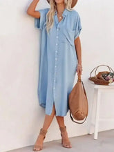 Light blue denim midi shirt dress with short sleeves button-down front and chest pocket shirt dress