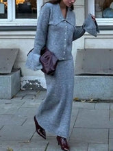 Gray knit two-piece set with flared sleeves, button front cardigan and skirt