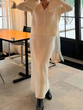 Cream-colored knit sweater with wide collar in Button Down Long Sleeve Cardigan and Skirt Knit Set
