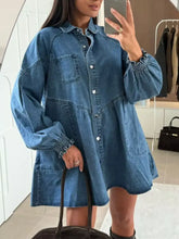 Blue mini denim dress with heart-shaped buttons, elasticated cuffs, and front pockets in denim fabric