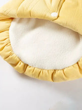 Yellow quilted pet jumpsuit with ruffle collar, white fleece interior