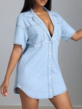 Light blue short sleeve denim dress with button-front design made from machine wash cold fabric