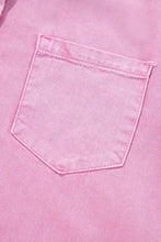 Pink denim pocket with neatly stitched edges on a short sleeve denim dress for casual wear