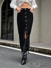 Black denim skirt with button front closure and high slit midi length for stylish casual wear