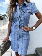 Light-wash denim dress featuring short sleeve denim design and button front for casual wear