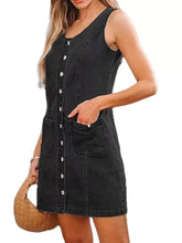 Black sleeveless denim dress with front button closure and two side pockets in a casual denim dress design