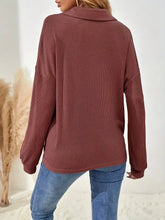 Button-front waffle knit polo sweatshirt in rust with a high collar, machine wash cold for easy care