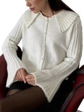 Cream-colored ribbed flare sleeve cardigan with wide collar