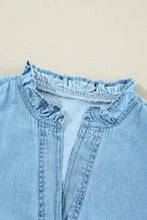 Light blue denim dress with ruffled collar front seam detail and notched long sleeve designed for machine wash cold