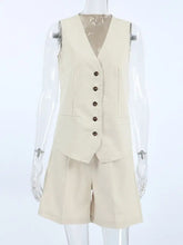 Button up vest and shorts set: cream sleeveless vest with brown buttons