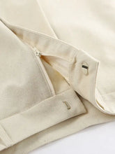Cream-colored canvas pants with zipper and button closure from Button Up Vest and Shorts Set
