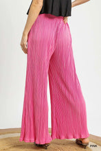 Bright pink umgee wide leg pleated textured pants with vibrant pink wide leg design and comfortable fit