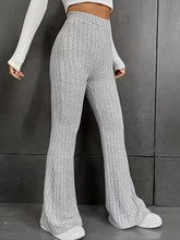 Plus size gray ribbed knit high waist flare pants with a comfortable fit and stylish flared design
