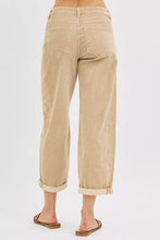 Beige corduroy crop barrel pants with wide-leg cropped and rolled cuffs for a relaxed fit offer comfort
