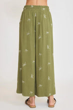 Umgee olive green wide leg pants with white embroidered bows and lace drawstring detail plus size design