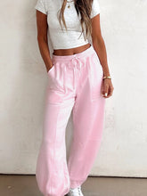 Soft pink casual drawstring sweatpants with high-waisted relaxed fit joggers machine wash care instructions included