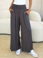 Gray basic bae full size wide leg pants with smocked wide waistband elastic and side pockets including care instructions