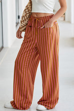 Striped wide leg pants in coral and mustard with stripe button pocket tie waist and elastic drawstring for casual wear